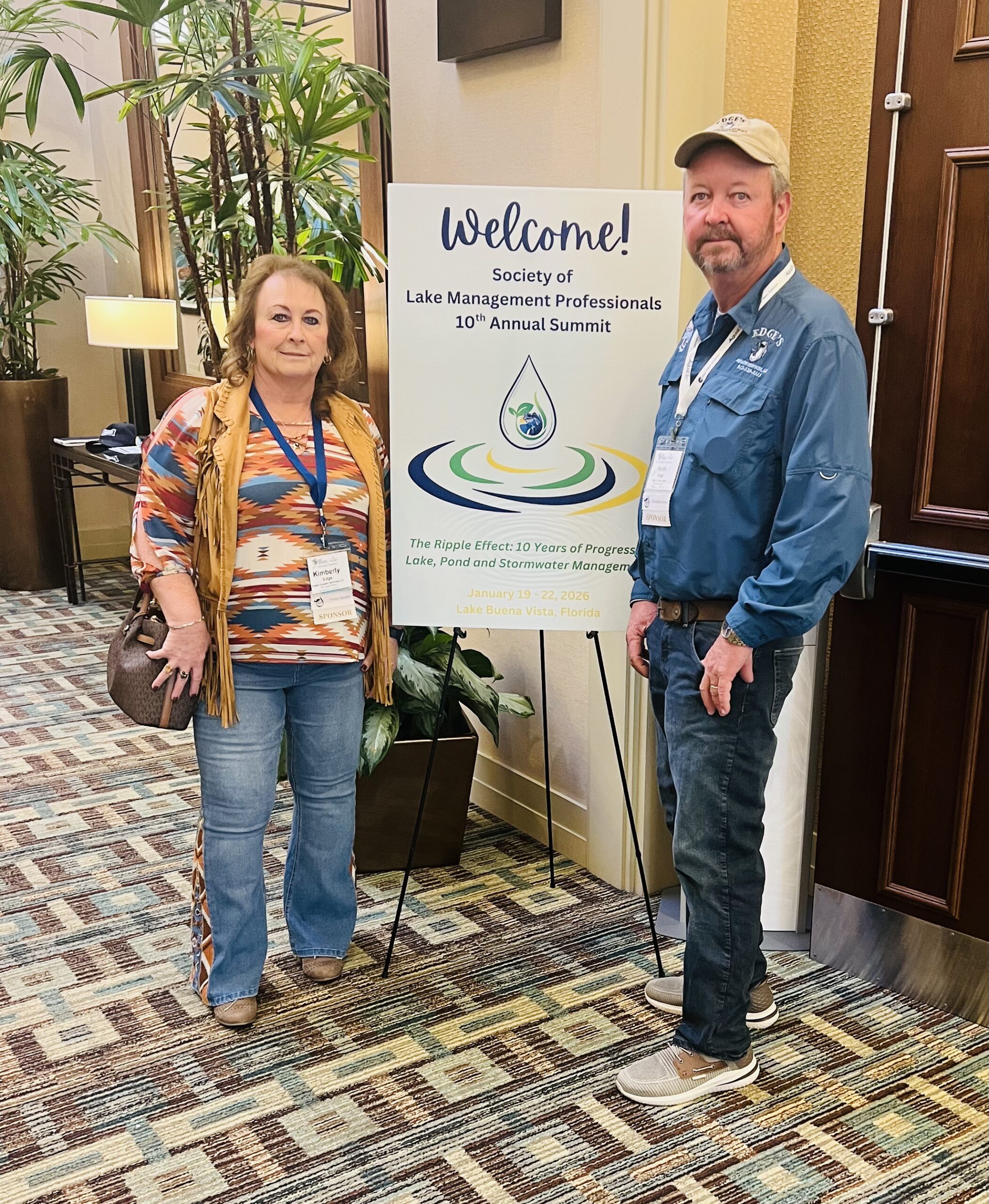 Kim edge and Keith edge at the society of lake management professionals 2025 summit in lake buena vist, Florida with Bob Lusk and Bill Dance